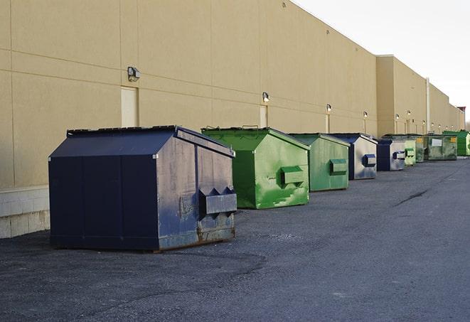 large construction dumpster positioned on a city street in Bismarck, ND